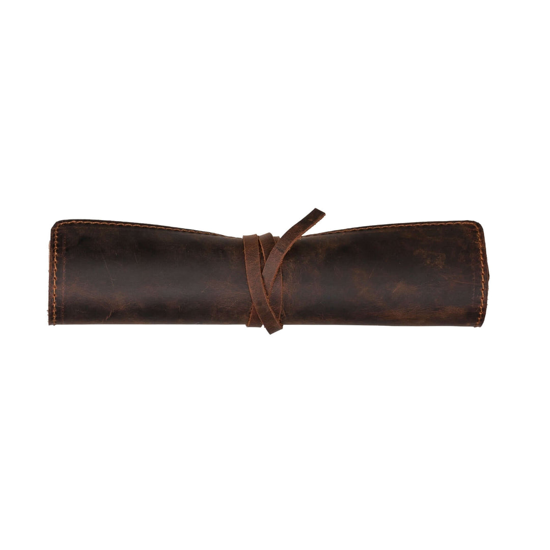 Broomfield handcrafted leather journal cover with strap, showcasing elegant and durable design, perfect for notebooks.