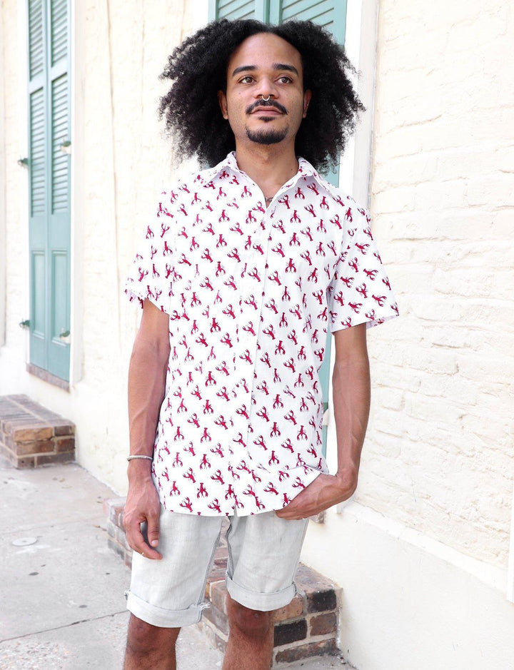 Red crawfish print organic cotton button down shirt on white background for men