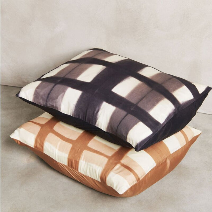 Handcrafted black and white shibori pattern mulberry silk pillow cover with traditional Japanese resist-dye design