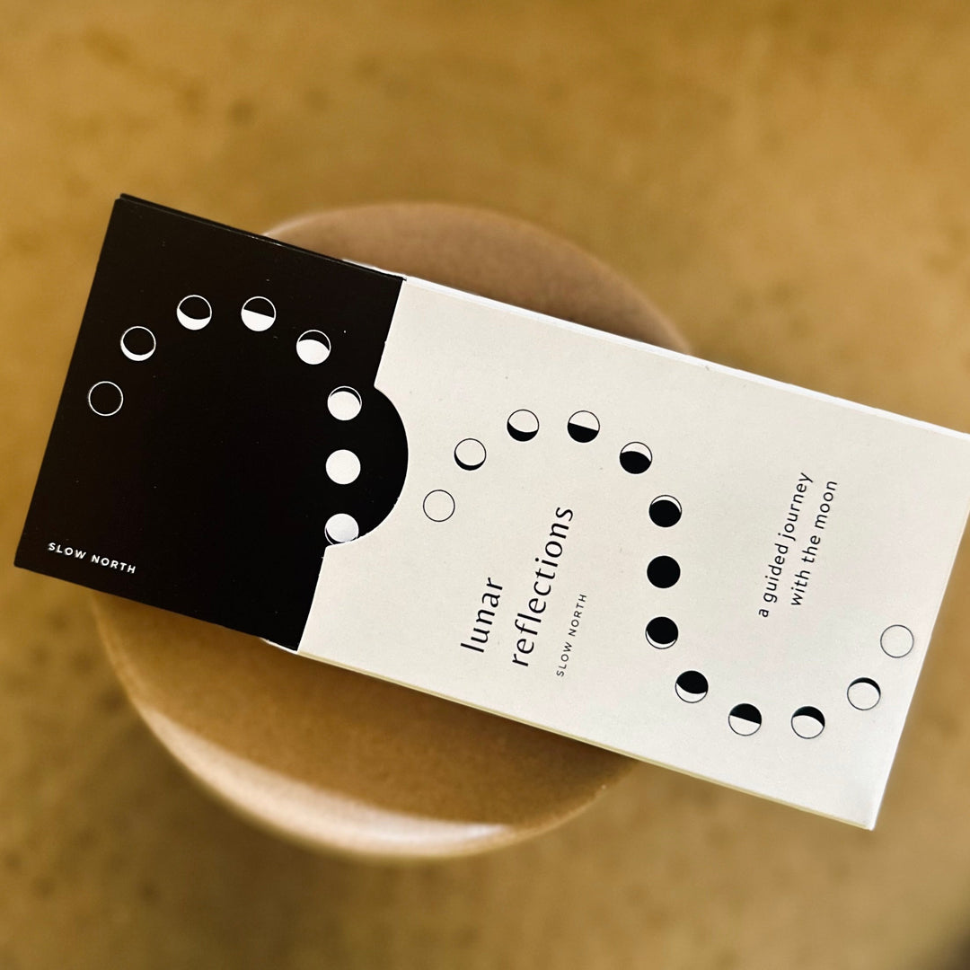 Lunar Reflections Mindfulness Cards box displaying moon phases, enhancing mindfulness and self-awareness with lunar cycle alignment.