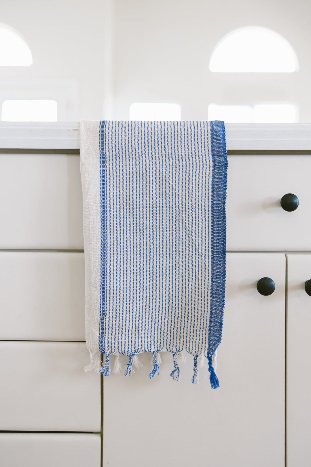 Handwoven ivory blue Turkish cotton hand towel with soft texture and artisan crafted details