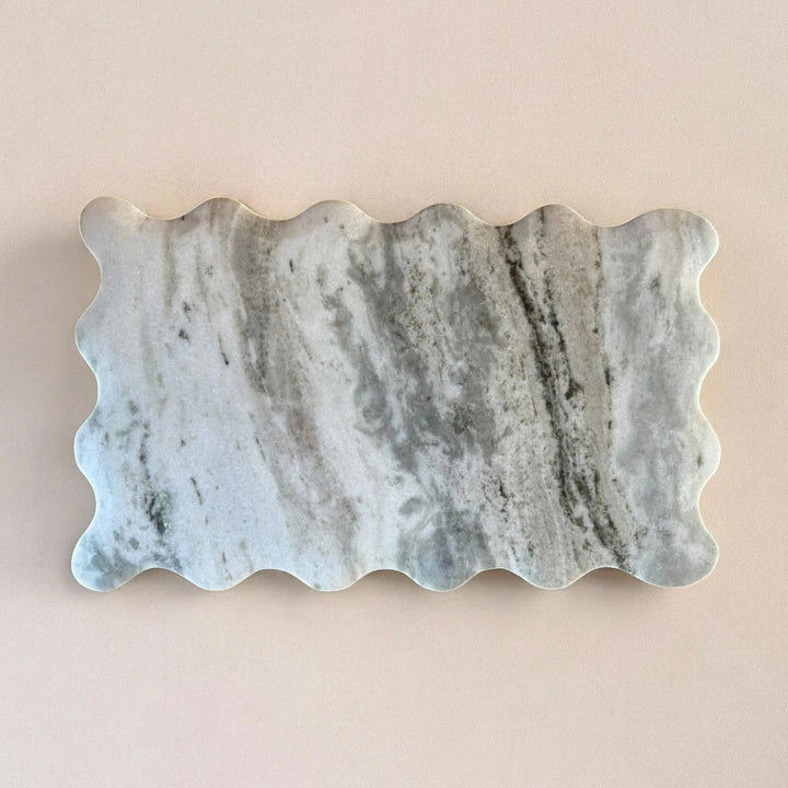 Hand carved Toronto marble serving board with natural stone veining and smooth finish for cheese and appetizers