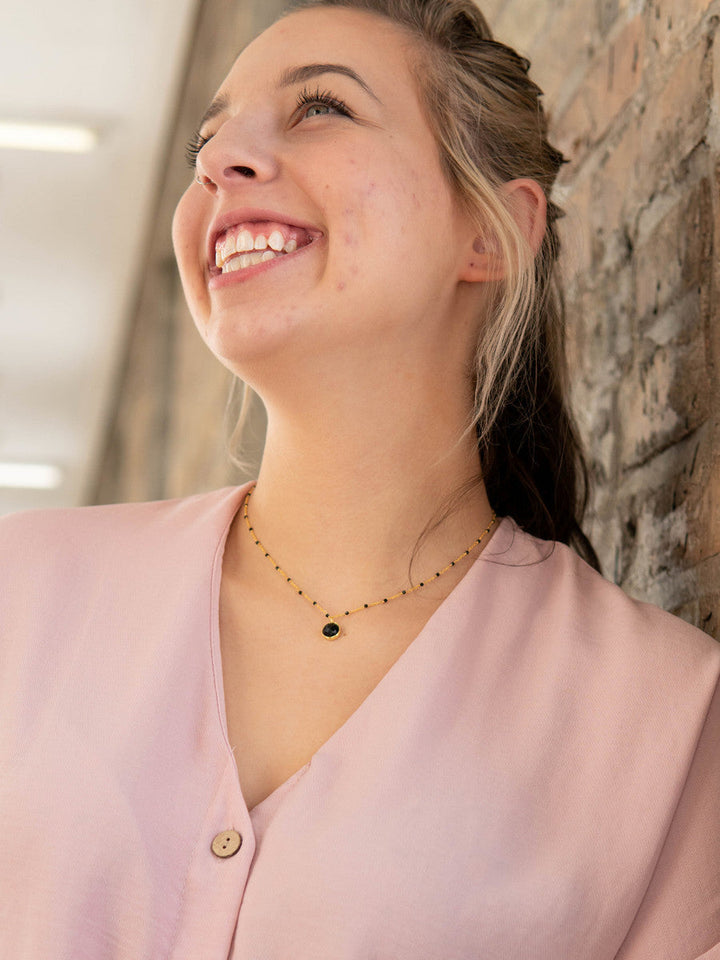 Black Beaded Gold Drop Necklace