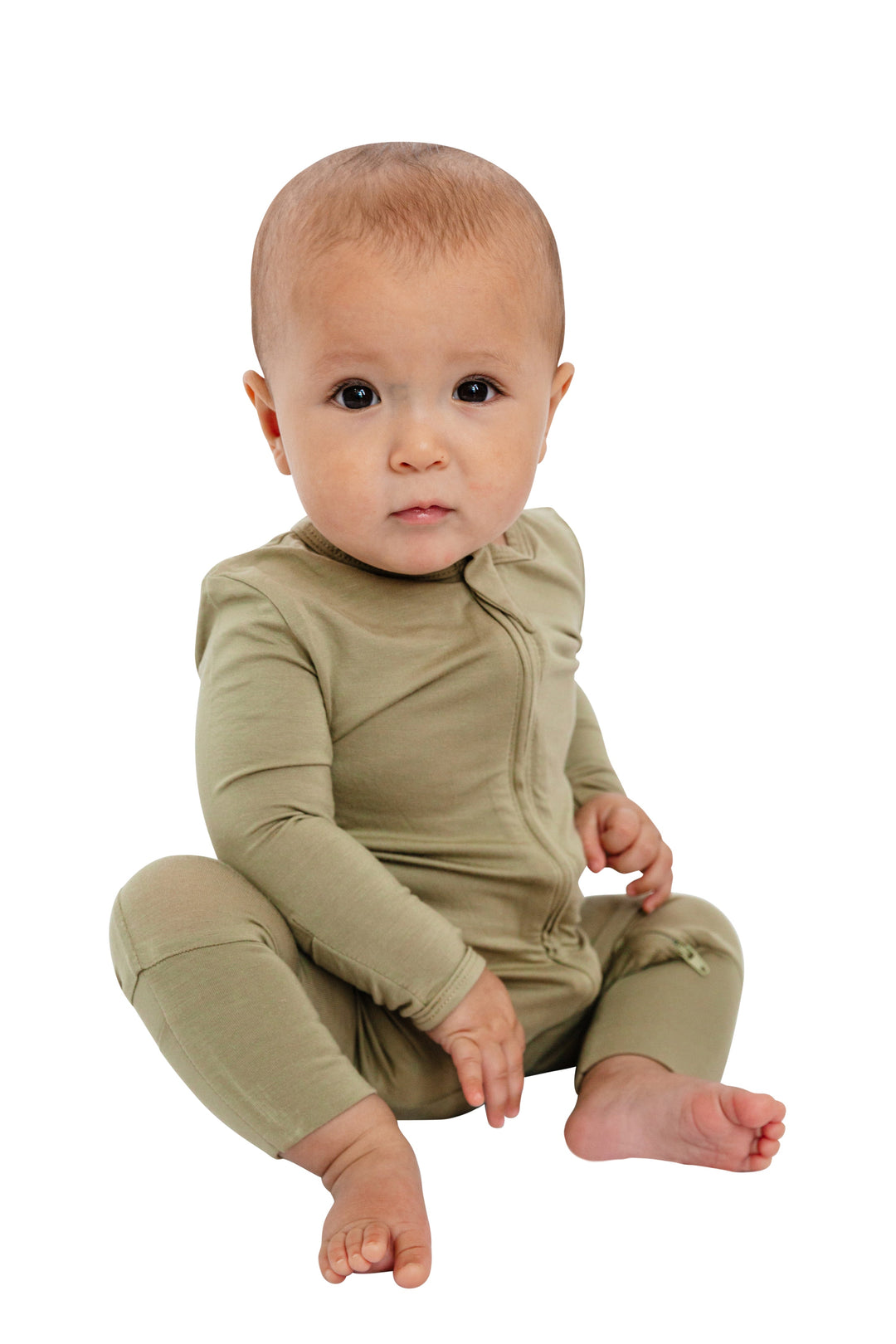 Baby wearing Luxe Bamboo Baby Pajamas in Moss Green with fold-over footie, two-way zipper, and zipper guard for comfort, sitting on white background.