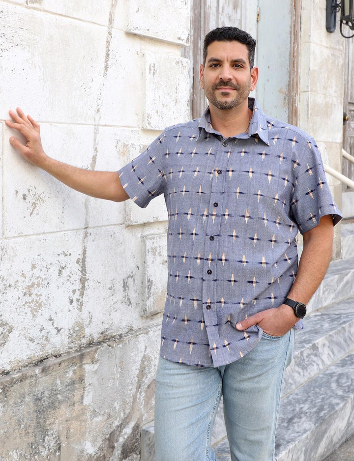 Blue chambray ikat organic cotton men's button down shirt with handwoven geometric pattern and short sleeves