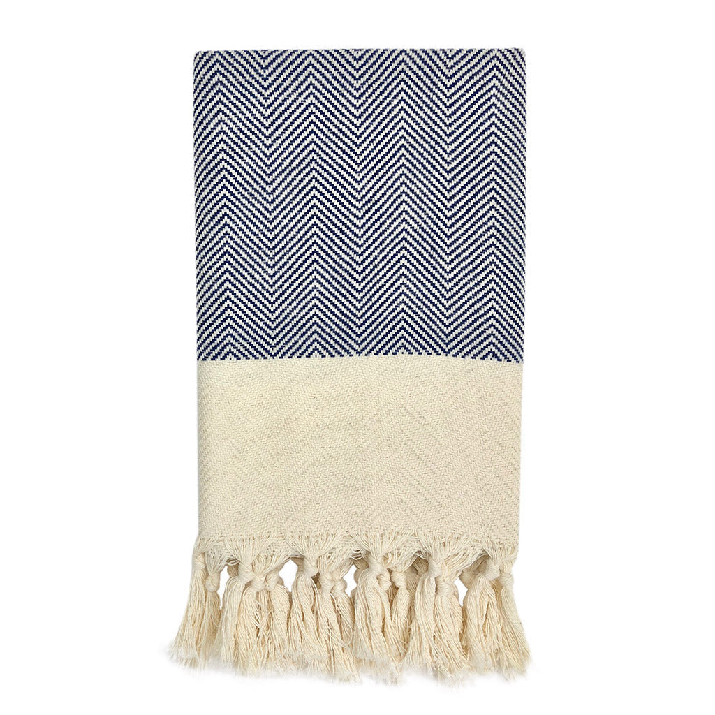 Herringbone patterned Turkish cotton hand towel with hand-knotted fringe edges in neutral tones