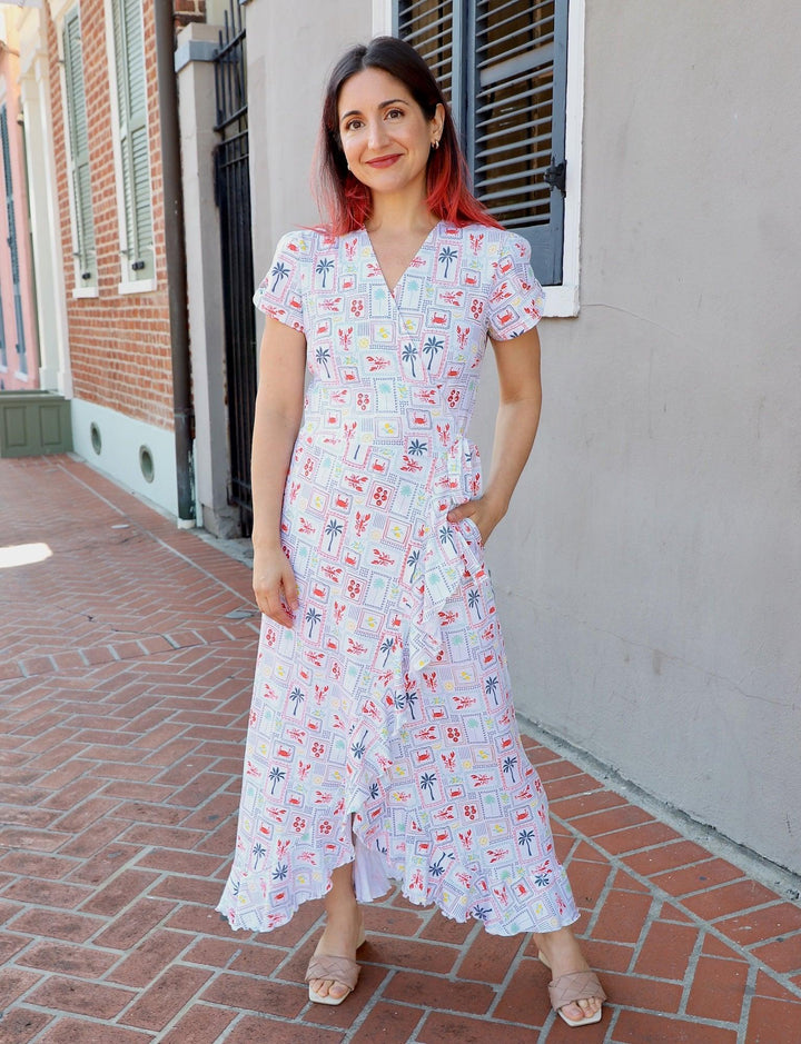 Colorful organic cotton wrap dress with ruffle hem and New Orleans inspired hand screen printed design