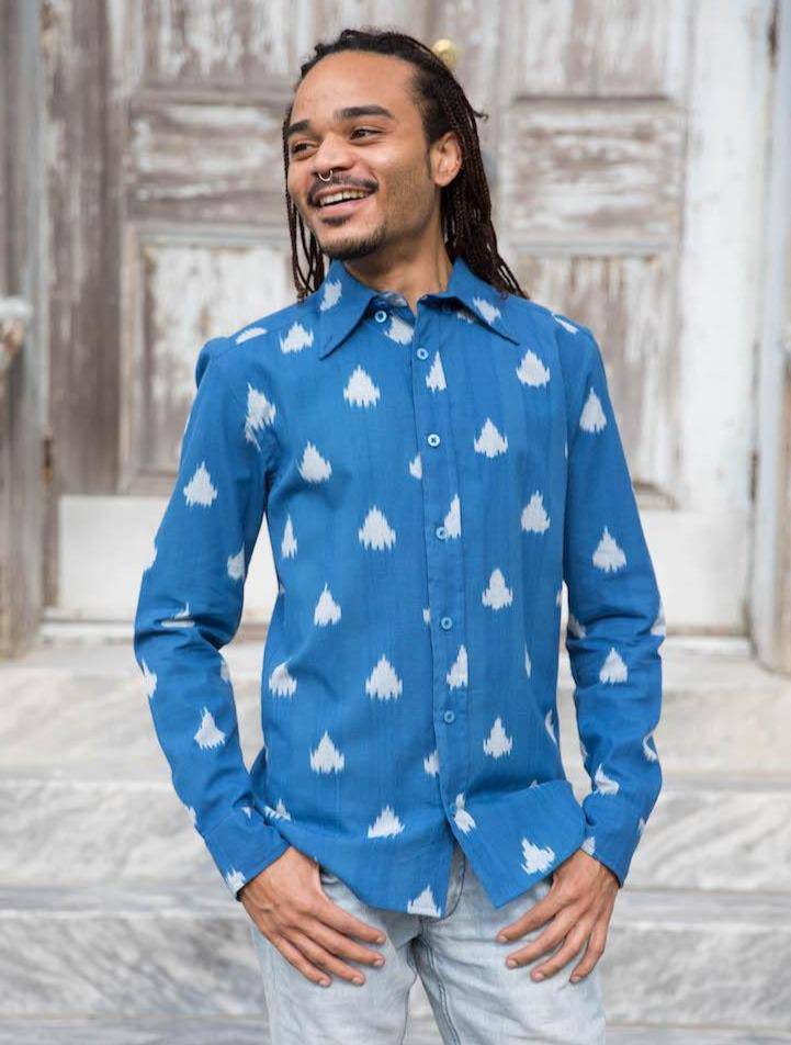 Cobalt blue men's button down shirt with triangular ikat pattern laid flat showing slim fit tailoring