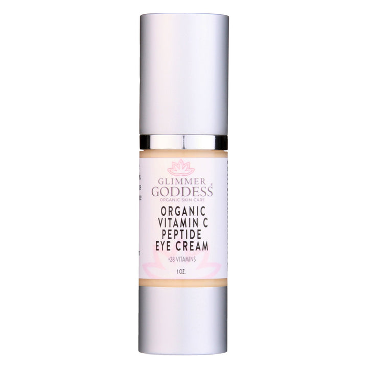 Organic vitamin C eye serum bottle with brightening peptide treatment for dark circles and under eye care