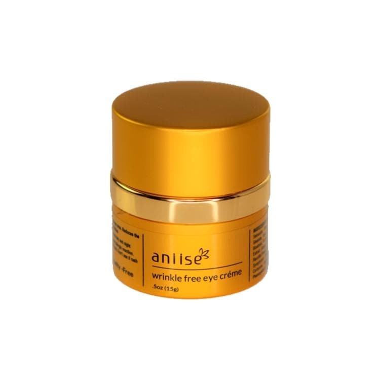 Gold jar of Anise Wrinkle-Free Eye Creme, 0.5 oz, for anti-aging skincare