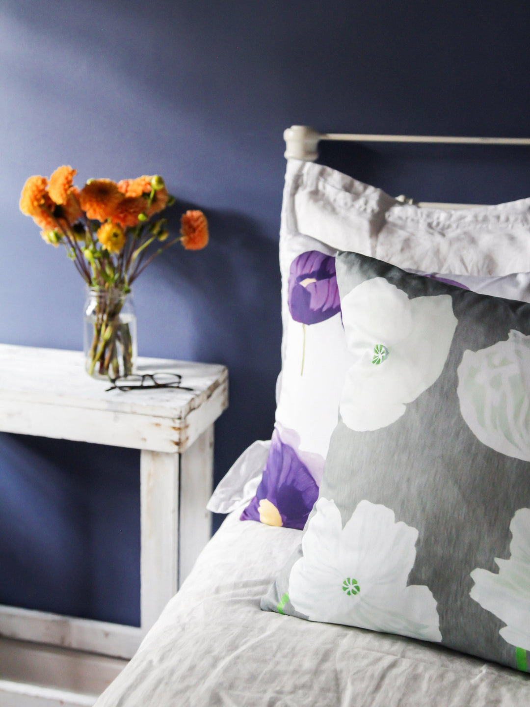 Throw Pillow: Purple Poppies on Snow