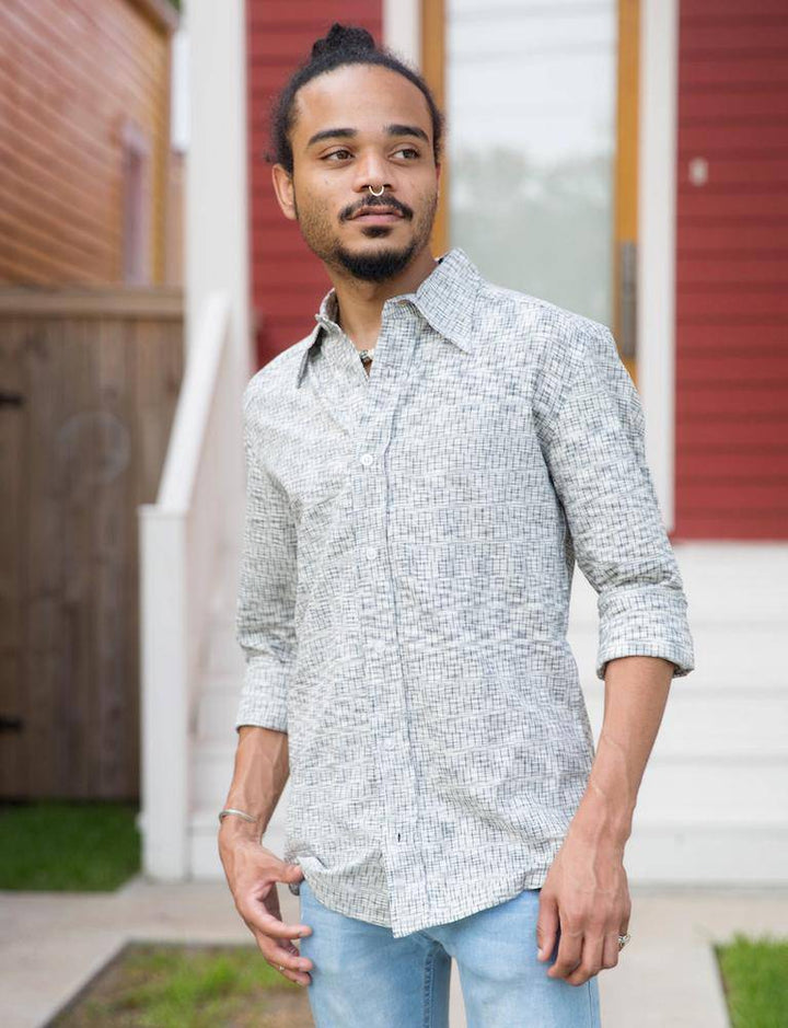 Grey handwoven cotton button down shirt with slim fit tailoring and traditional ikat fabric texture