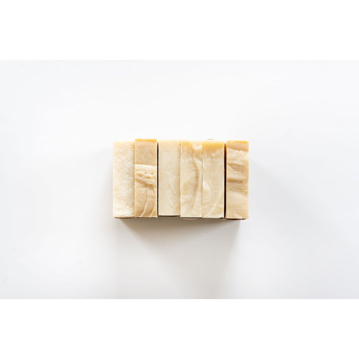 Unscented Castile bar soap bars, palm-free, made from saponified olive oil, minimalist natural soap on a white background
